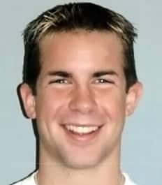 A smiling young man with perfect teeth without spacing issues