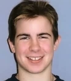 A smiling young man with spacing issues